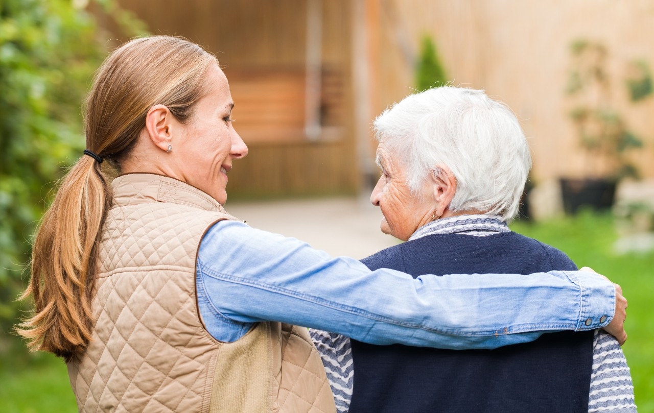 Dementia caregiver with woman