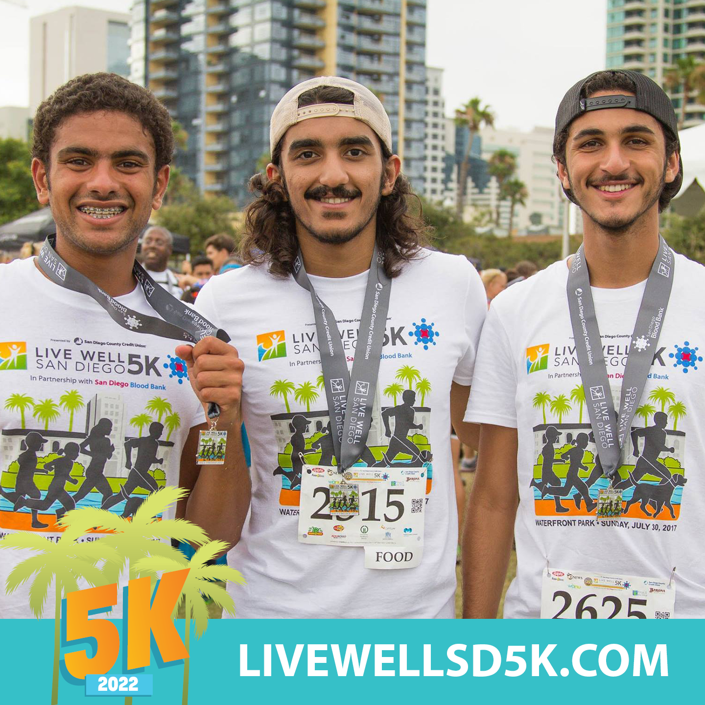 group of 3 male friends with 5K t-shirts and medals
