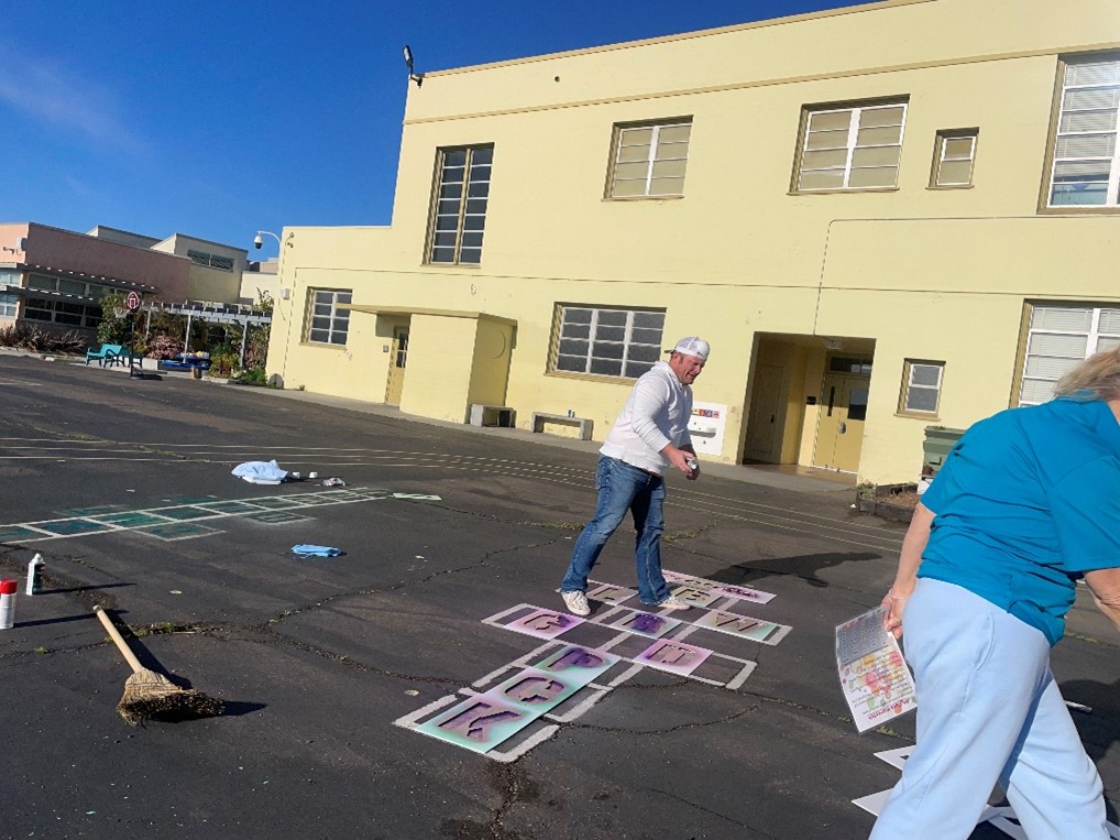 HSEC Team Installing Playground stencils at Carson Elementary