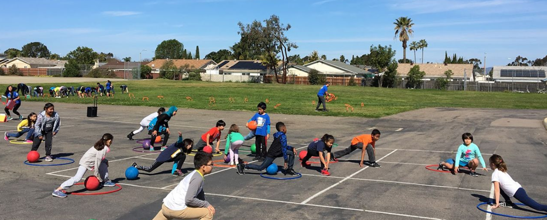 Children exercising at school