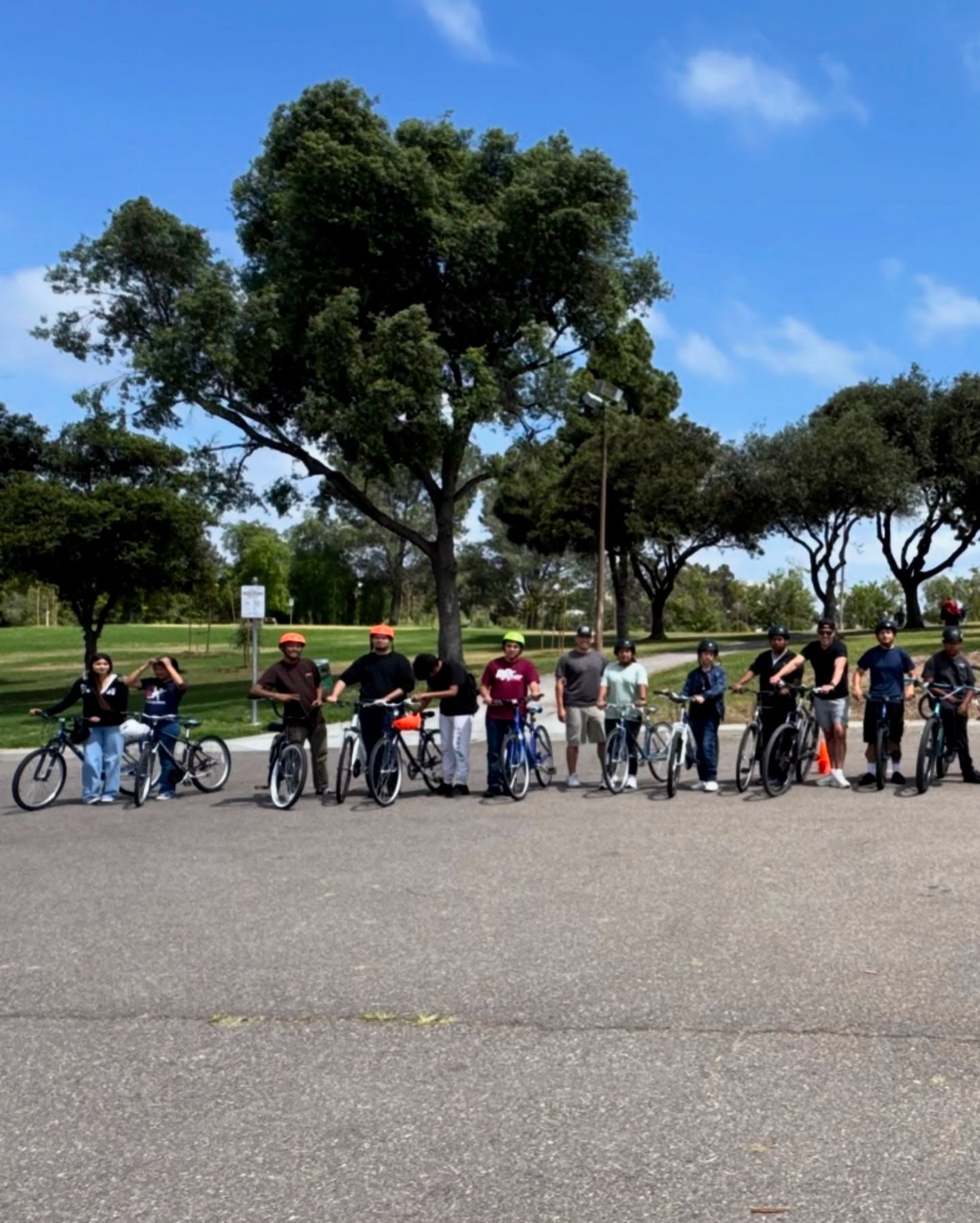 Youth Participants Learning Bike Safety Outdoors