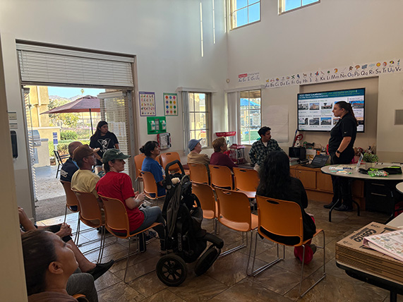 group of community members together in safety meeting