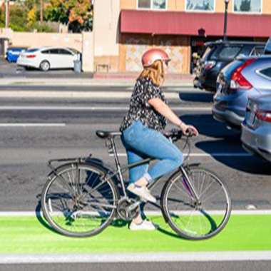 Inidividual riding bike with proper safety equipment