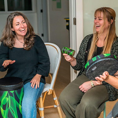 thumbnail of two participants playing musical instruments